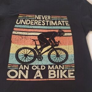 Graphic Black T-Shirt - Never Underestimate an Old Man on a Bike Size Medium